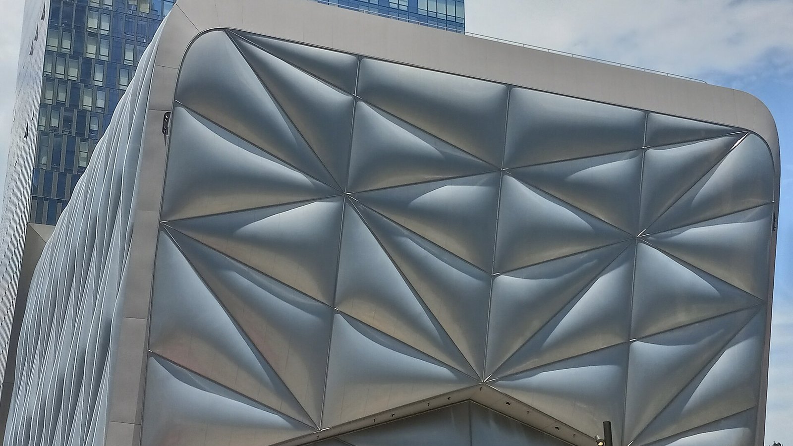 Quilted silver panels of The Shed arts center at Hudson Yards in New York