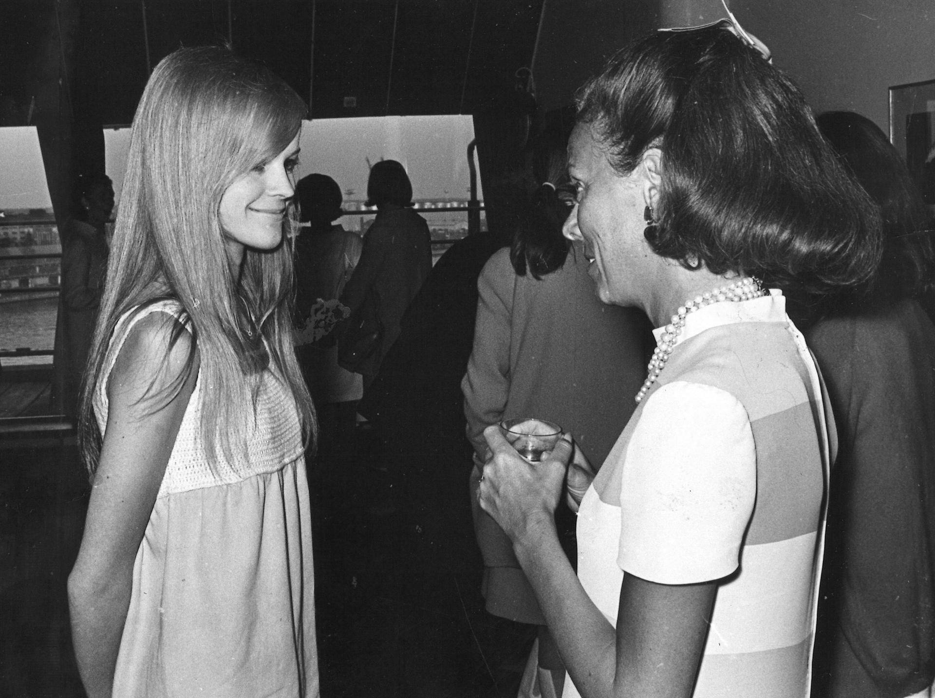 Eileen Ford, right, talks with Finnish model Ritva Haikola in Finland, 1967